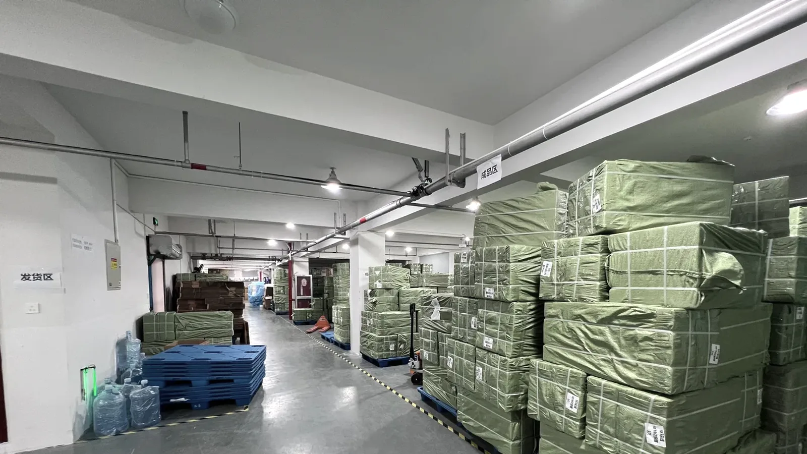 Shipping area with pallets of packed orders ready for worldwide dispatch