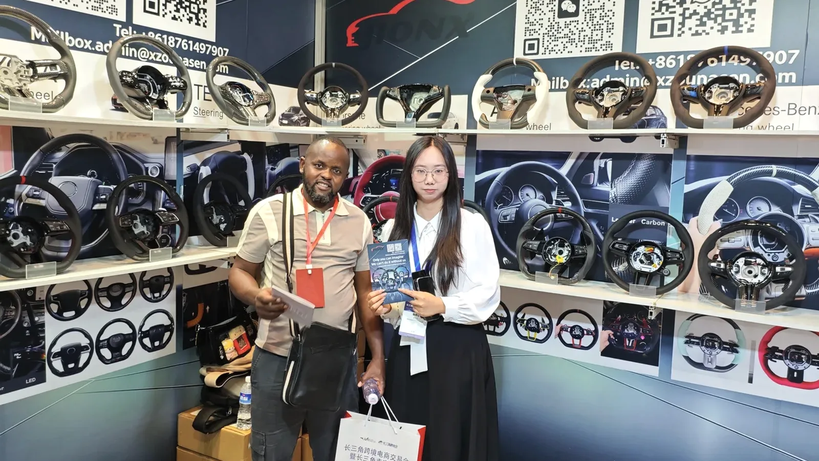 VELMORA team meeting an overseas customer at an international trade show